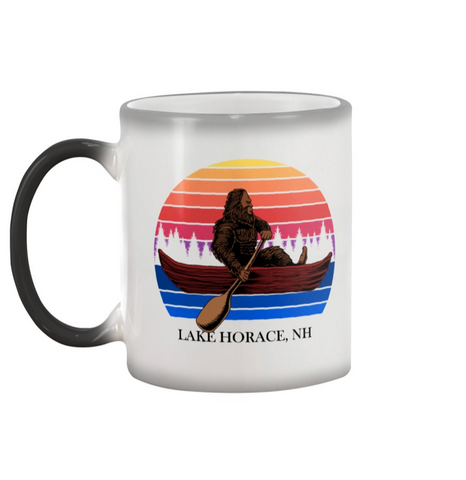 bigfoot in a canoe color changing mug. He magically appears